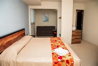 Jr. Suite king c/sofá